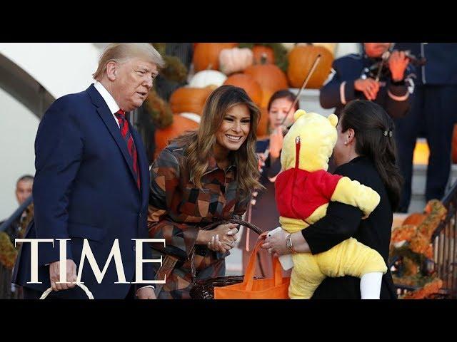 Trump & Melania Putting Candy On Head Of Trick-or-Treater Dressed As Minion Is A Flash Point | TIME