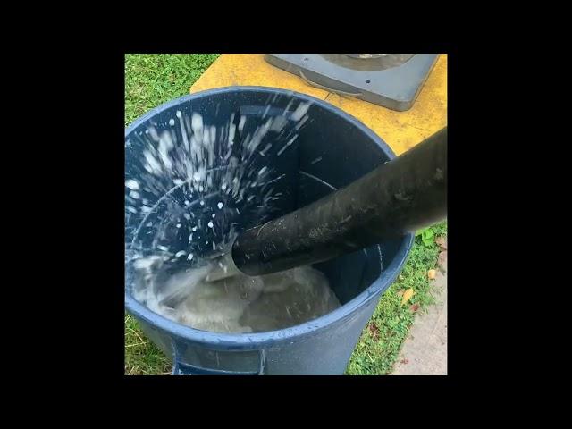 Cleaning out the pipes on a concrete pump without using a sponge