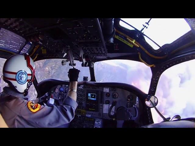 Cockpit View: Firefighting Airplane Working A Wildfire