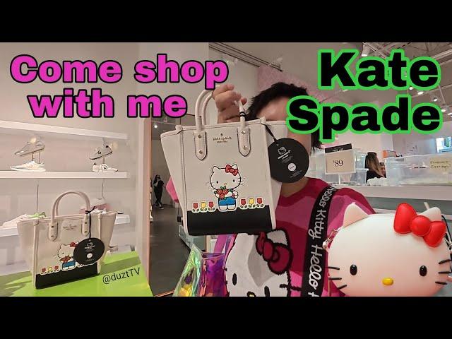 Shopping for Hello Kitty bags at Kate Spade in the U.S.