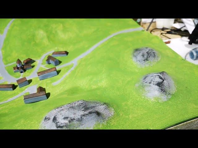 How I made a (floodable) model village theatre prop.