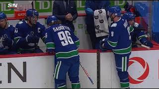 John Garrett and Jim Hughson break out into a duet