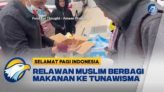 Relawan Muslim Berbagi Makanan ke Tunawisma