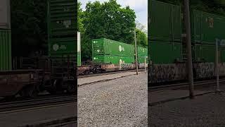 Eastbound intermodal passes the Pennsylvanian at Lewistown (05/08/2025)