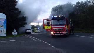 Car on fire & Firefighters