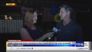 Fans cheer for Paige Madden as she competes in the 2020 Olympics