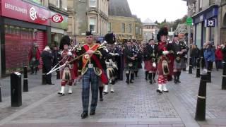 Massed Pipe Bands parade through Inverness City centre for Crocus Group event April 2017