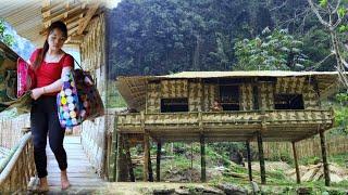 The girl completed the construction of the bamboo house and moved the furniture in - Bàn Thị Ta