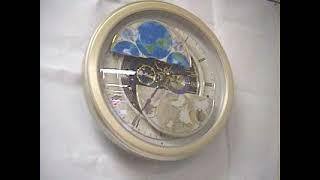 "Timecracker Time-Trip" Rhythm Magic Motion Clock 4MH754NR18