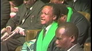 Chiluba praying during funeral of the Zambia National team in 1993