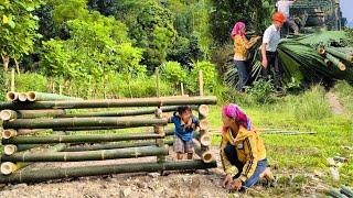 Young engineer brought lots of bamboo and palm leaves to help the mother and daughter build  pig pen