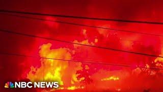 Wildfires burn across Portugal killing several people