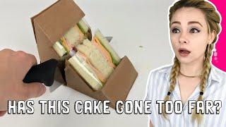 The plastic is edible and the sandwich is a cake