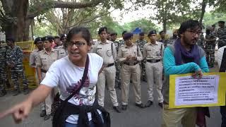 Sarika Choudhary protesting at Assam Bhavan against the killing of five Bengali-speaking people