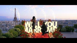 Epic rooftop Paris proposal with marry me letters