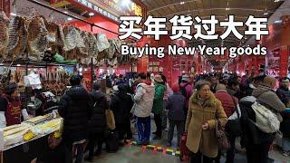 Buying New Year goods on a large Chinese New Year goods street during the Spring Festival