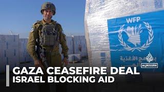 Israel cuts off aid to Gaza as it seeks to change ceasefire deal with Hamas