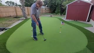 Putting on Star Pro Greens backyard Green.