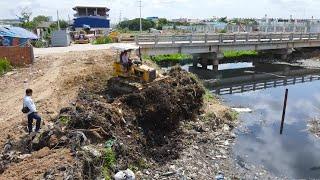 Incredible Nice Build Road Landfill Operator Bulldozer Clearing Dirt , Truck Unloading Dirt in Water