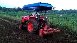 KUBOTA MX5000  TRACTOR PLOWING FIELD FARMER