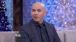 Pitbull Loves Strong Women, Pantsuits, and Making Education Sexy!