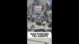 Man punches TSA agents