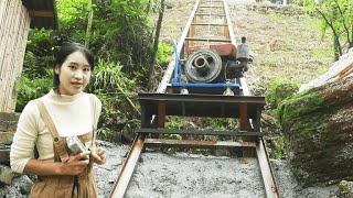 The machine is too heavy to carry up the mountain? The girl's hand rubs the slide cargo ladder  a