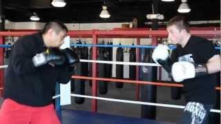 Dave Reeves boxing Mikey Custodio