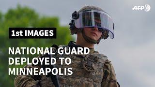 National Guard deployed to Minneapolis stand guard after violent protests overnight | AFP