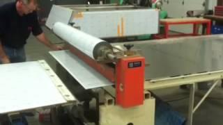 AWI Manufacturing Applying PVC Protective Film to Stainless