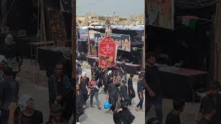 Shiite Muslims march during a religious procession on the 9th day of holy Islamic month of Muharram