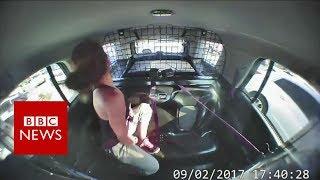 Handcuffed US woman escapes in police car after arrest - BBC News