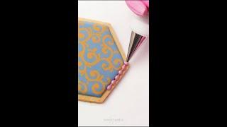 Decorating a cookie with royal icing