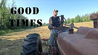 First cutting hay continues. Tedding hay with the Farmall Super M