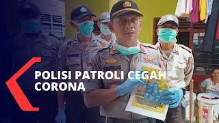 Polisi Patroli Sosialisasi Penyebaran Virus Corona