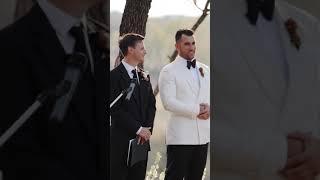 Groom shooting the breeze with officiant as he waits for bride! ️