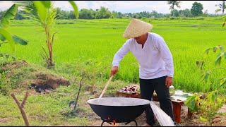 Cooking giant squid and octopus amidst rice fields I Joseph The Explorer