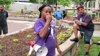 Jamie McAtee speaks before the march