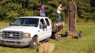 Pop up bale loader