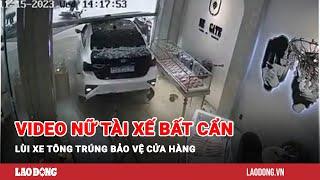 Video nữ tài xế bất cẩn lùi xe tông trúng bảo vệ cửa hàng | Báo Lao Động