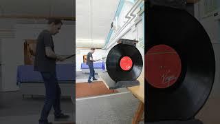 Shoot an arrow through LP record