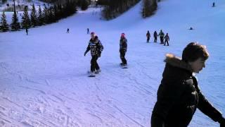 Kid's snowboarding.