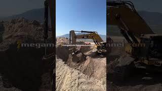 Caterpillar Excavator Loading Trucks!