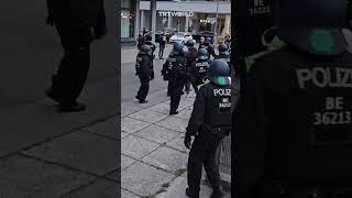 Berlin police forcefully push a female pro-Palestinian protester