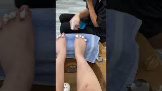 The nail tech gags over smelly feet 