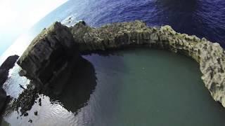 Cliff jumping at the Blue Hole in Gozo, Malta