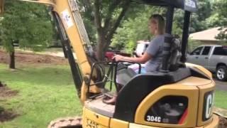 Woman Working the Backhoe - InfillNashville.com