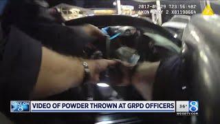 Bodycam video: GRPD officers exposed to white powder