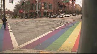 Rainbow crosswalk in Midtown marked up by reckless drivers