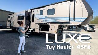 A True Four-Season Luxury Toy Hauler   #camping #rvlife #luxefifthwheel #fulltimerv #gorving